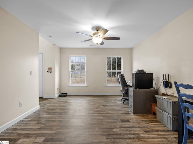 office area featuring dark hardwood / wood-style flooring and ceiling fan