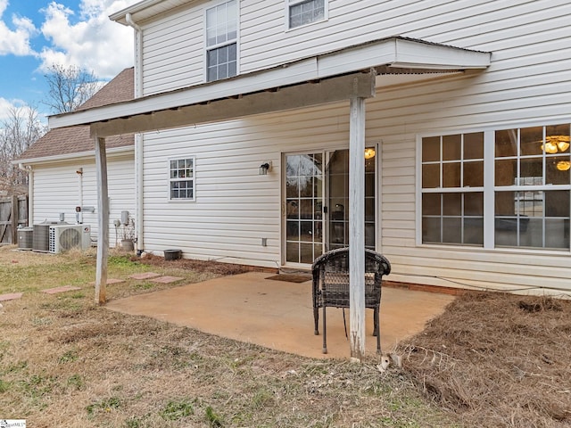 rear view of property featuring a patio area