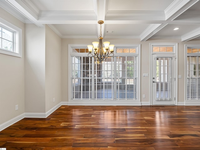 unfurnished dining area with baseboards, coffered ceiling, wood finished floors, crown molding, and beam ceiling