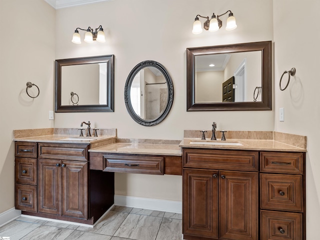 full bath with marble finish floor, vanity, and baseboards