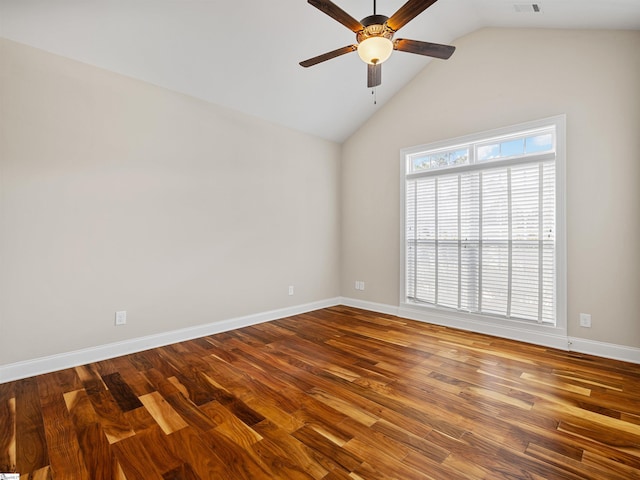 unfurnished room with visible vents, baseboards, ceiling fan, wood finished floors, and vaulted ceiling