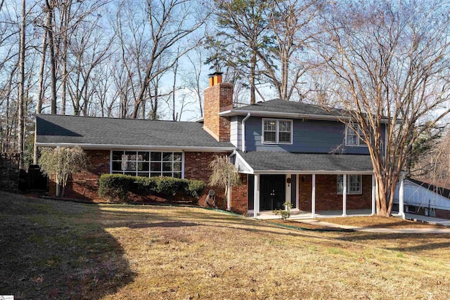 view of front facade with a front yard