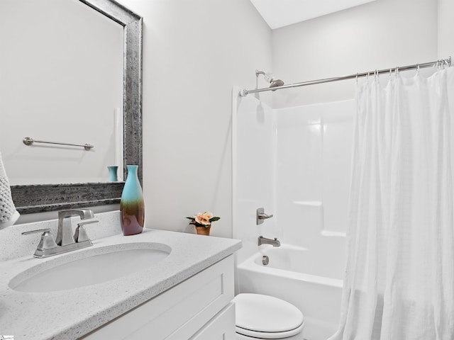 full bathroom featuring vanity, toilet, and shower / tub combo