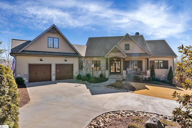 craftsman house with a garage