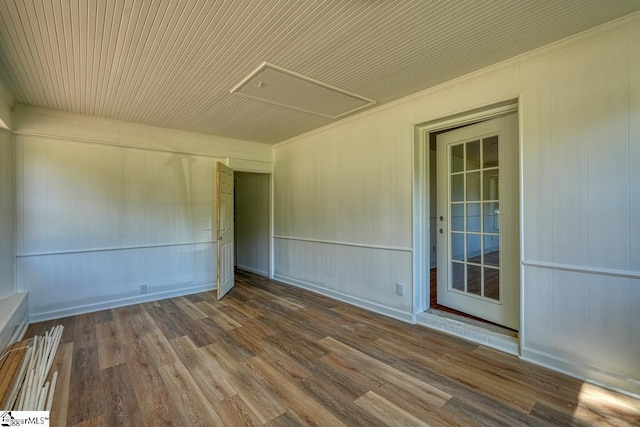 empty room with hardwood / wood-style floors