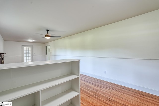 spare room featuring ceiling fan and light hardwood / wood-style floors