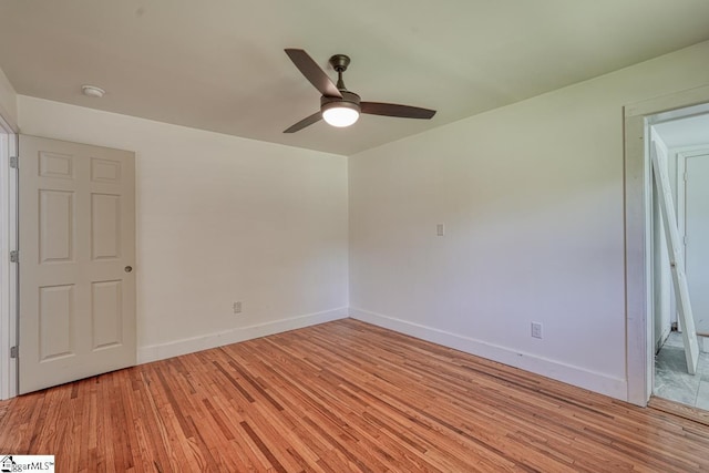 unfurnished room featuring ceiling fan and light hardwood / wood-style floors