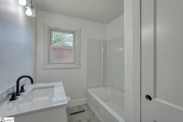 full bathroom with vanity, shower / tub combination, and toilet