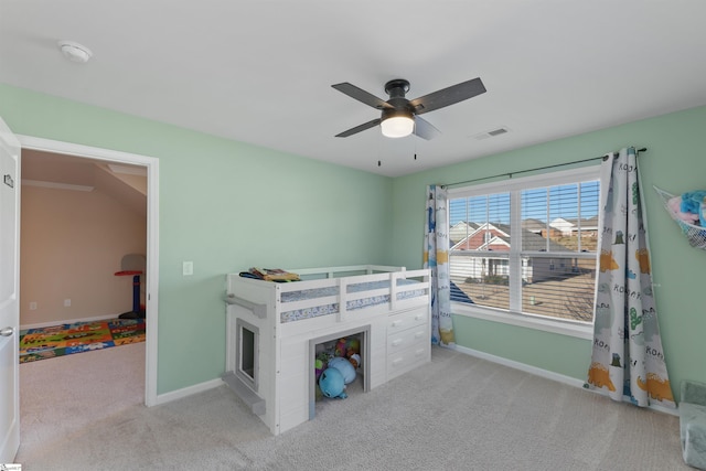 carpeted bedroom featuring ceiling fan