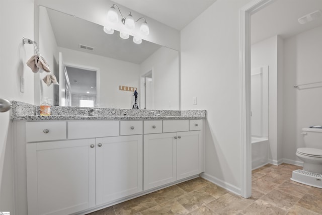 bathroom with vanity and walk in shower