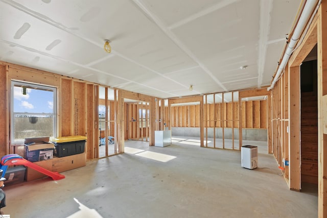 miscellaneous room with concrete flooring