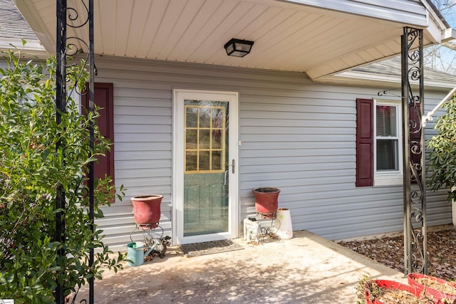 property entrance with a patio