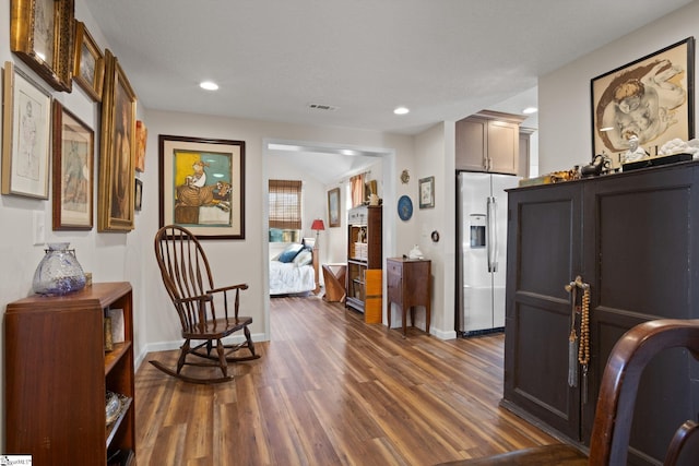 living area featuring dark hardwood / wood-style flooring