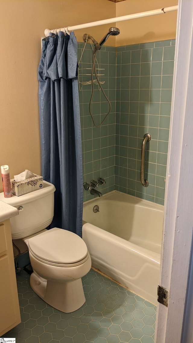 bathroom with shower / bathtub combination with curtain, tile patterned floors, and toilet