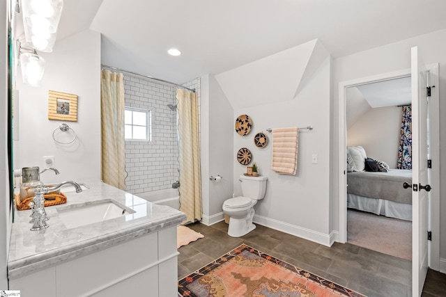 full bathroom featuring shower / bath combination with curtain, vanity, and toilet