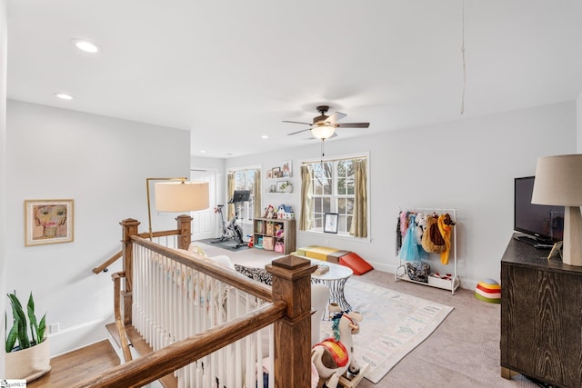 interior space featuring ceiling fan