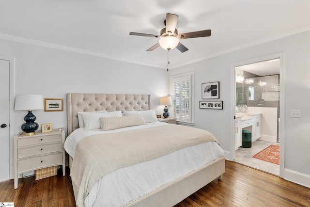 bedroom featuring connected bathroom, crown molding, dark hardwood / wood-style floors, and ceiling fan