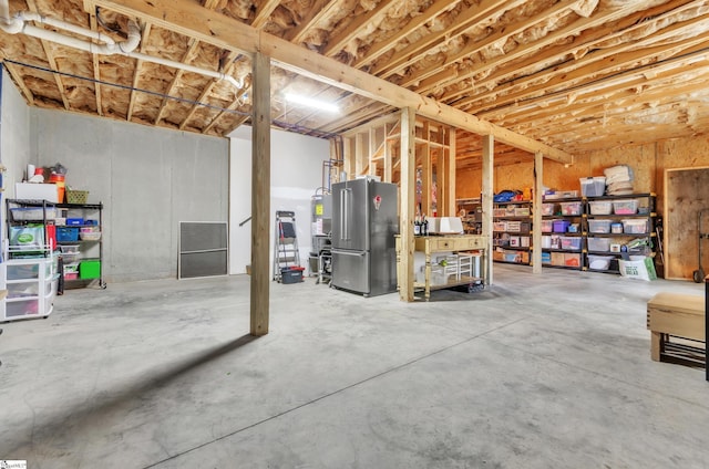 basement with high end refrigerator