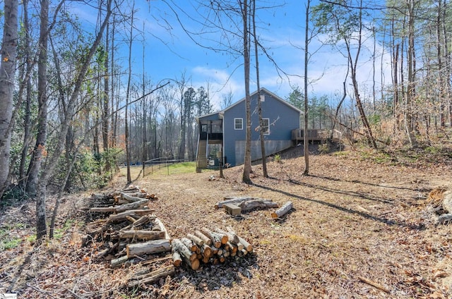 exterior space featuring a wooden deck