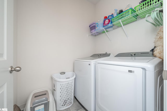 laundry room featuring washer and clothes dryer