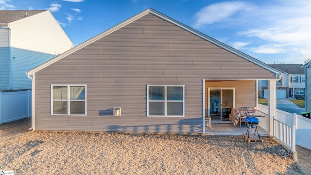 rear view of house featuring a patio