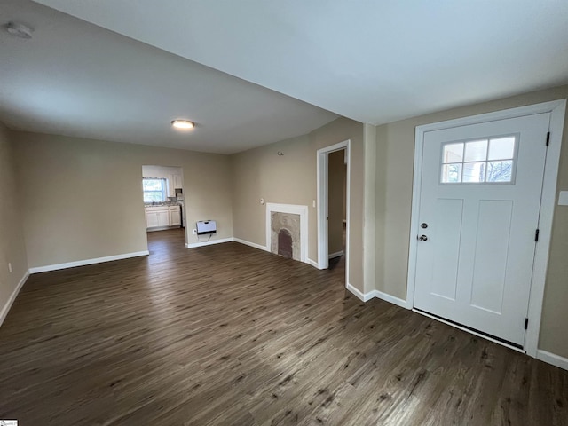 foyer entrance with dark hardwood / wood-style flooring