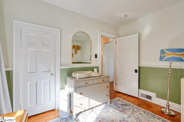 bedroom featuring light hardwood / wood-style floors