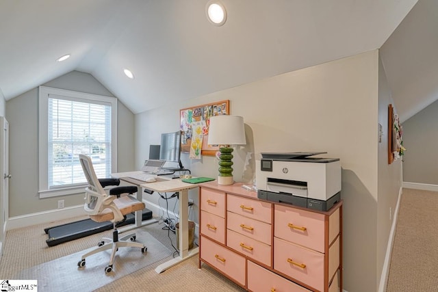 carpeted office featuring vaulted ceiling