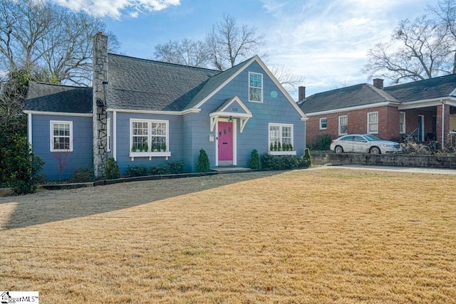 view of front of home with a front yard