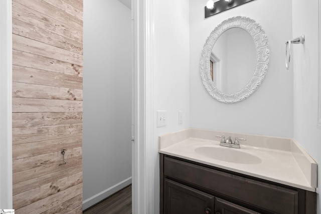 bathroom featuring vanity and hardwood / wood-style flooring