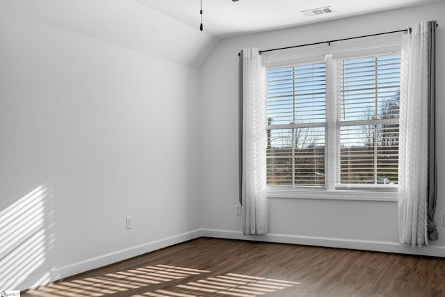 unfurnished room with dark hardwood / wood-style flooring and ceiling fan