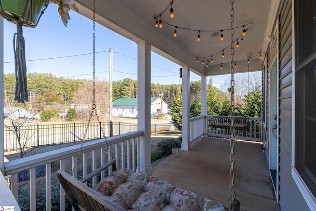 view of patio featuring a porch