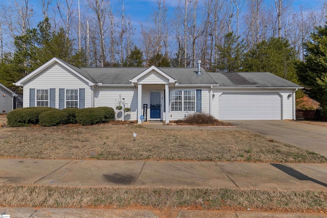 single story home with a garage and a front yard