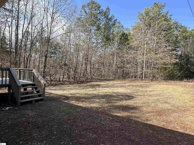 view of yard featuring a deck