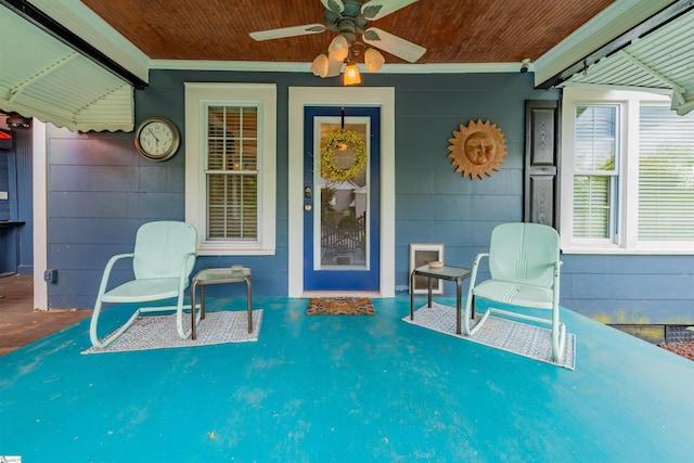 entrance to property with ceiling fan