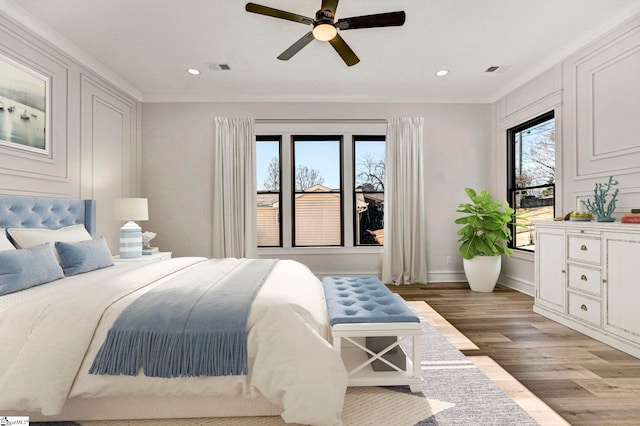 bedroom featuring ceiling fan and light wood-type flooring