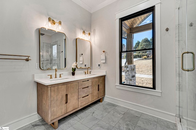 bathroom with crown molding, vanity, and a shower with door