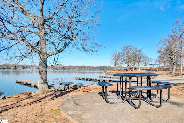 dock area with a water view