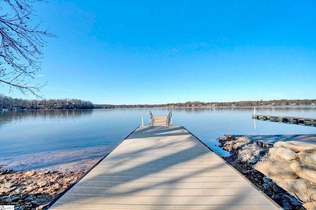 view of dock featuring a water view