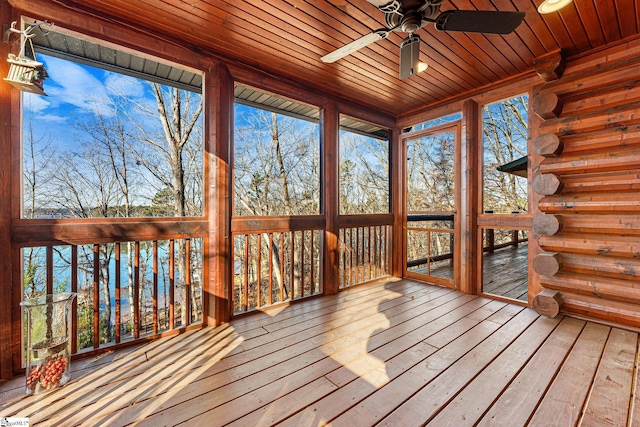 wooden terrace featuring ceiling fan