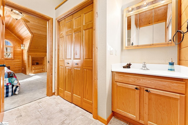 bathroom with vanity and ceiling fan