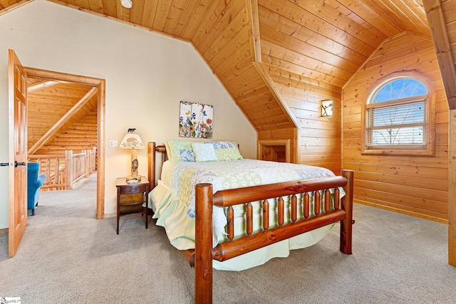 bedroom featuring wood walls, vaulted ceiling, carpet, and wooden ceiling