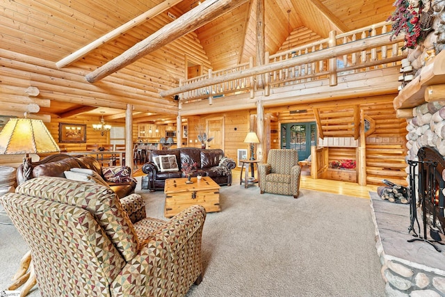 living room with rustic walls, wooden ceiling, a notable chandelier, and a stone fireplace