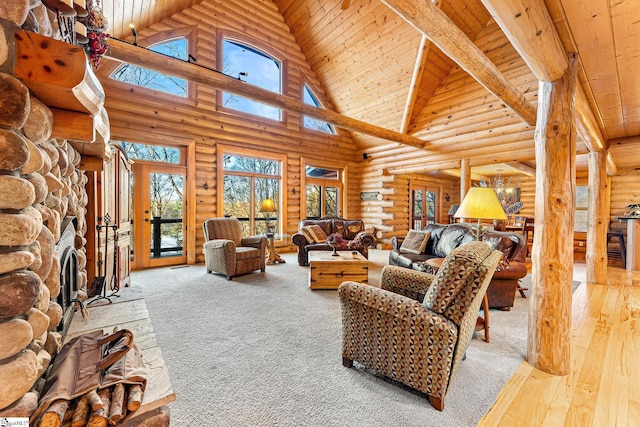 living room with lofted ceiling, a stone fireplace, wood-type flooring, and wooden ceiling