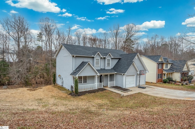 front of property featuring a garage, covered porch, and a front lawn