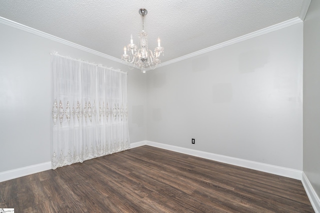 empty room featuring an inviting chandelier, crown molding, dark wood-type flooring, and a textured ceiling