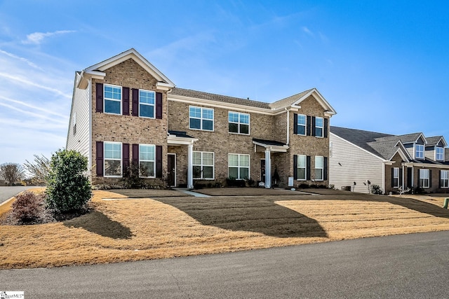 view of front facade with a front yard