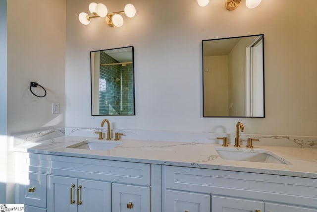 bathroom featuring vanity and a shower