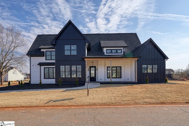 modern inspired farmhouse with covered porch