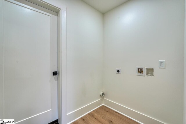 laundry area featuring washer hookup, hardwood / wood-style floors, and electric dryer hookup